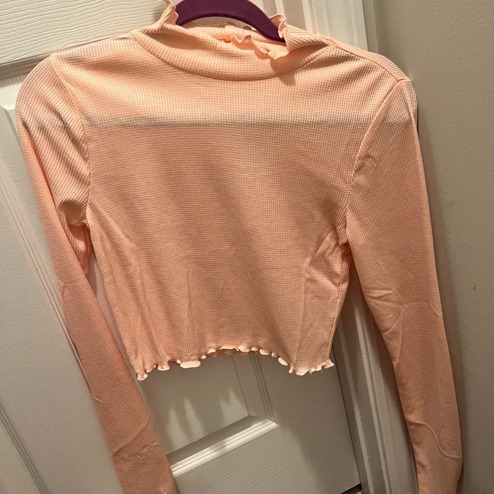 Pink turtleneck crop top